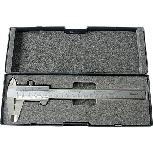 Photo of STANLEY 78-201 stainless steel caliper in foam-lined storage case, top angle view.