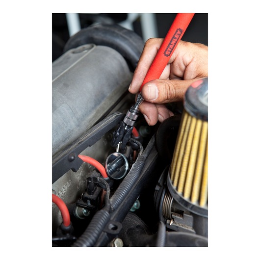 Stanley 78-241 inspection mirror tool used to check engine parts, close-up photography.