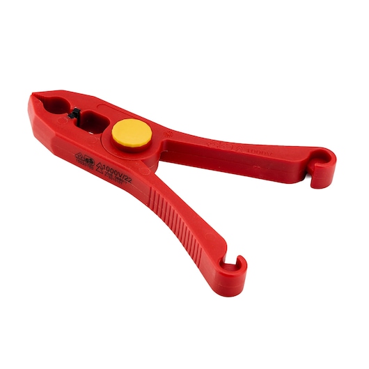 STANLEY STMT77872-LA red insulated wire stripper with yellow circular button, side angle on white background.