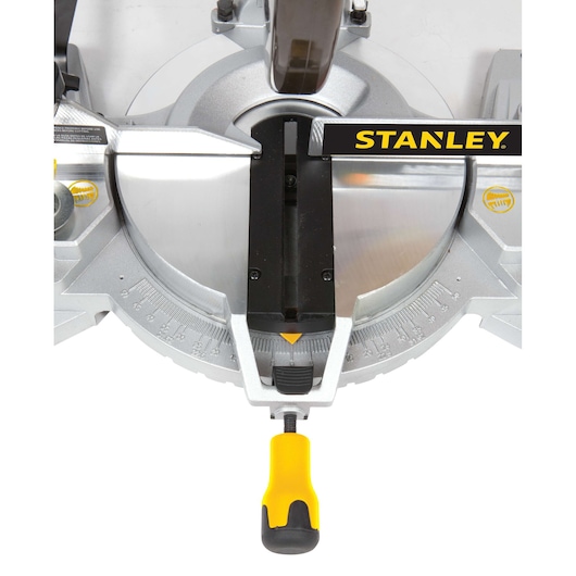 STANLEY STSM1525 miter saw top view showing silver base, angle gauge, and yellow-black handle.